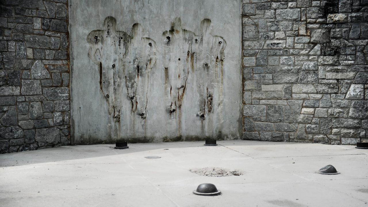 The statue of Penn State football coach Joe Paterno was torn down in July.