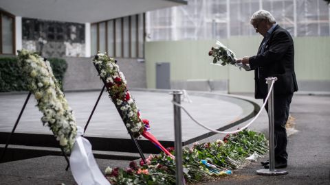 Citizens mourn and pay respects to victims of the attacks on Oslo and Utøya a year later.