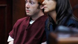 CENTENNIAL, CO - JULY 23:  James Holmes (L) makes his first court appearance at the Arapahoe County Courthouse with his public defender Tamara Brady on July 23, 2012 in Centennial, Colorado. According to police, Holmes killed 12 people and injured 58 others during a shooting rampage at an opening night screening of "The Dark Knight Rises" July 20, in Aurora, Colorado.  (Photo by RJ Sangosti-Pool/Getty Images)