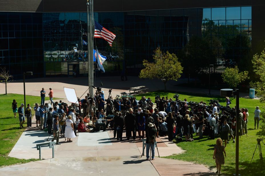 Flags fly at half-staff on July 23, 2012, at the Arapahoe County Courthouse  in Centennial, Colorado, where the movie theater shooting suspect had his first court appearance. The murder counts against Holmes carry a possible death penalty.