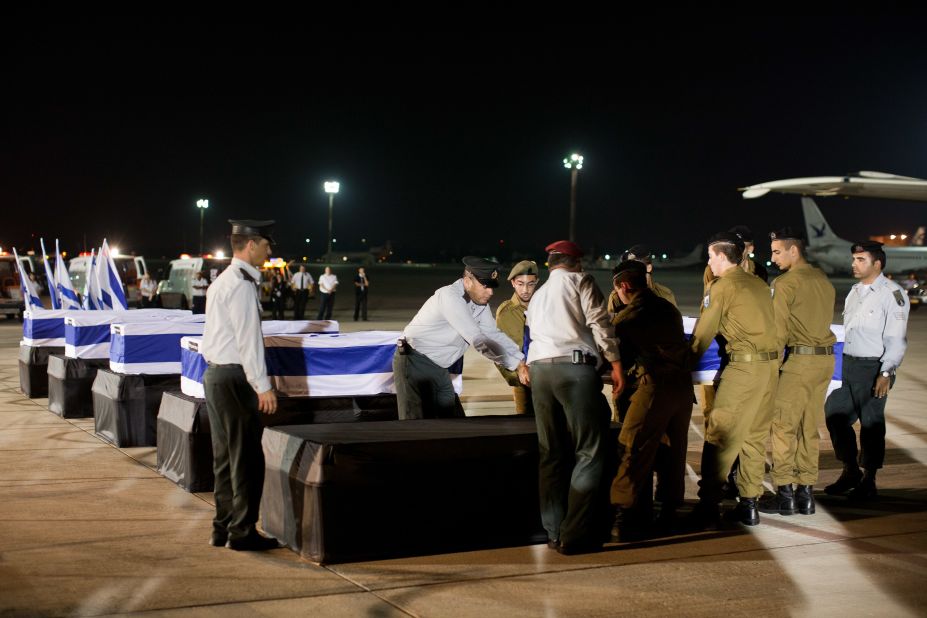 The bodies of Israeli victims of the Bulgaria bus bomb last week return home.