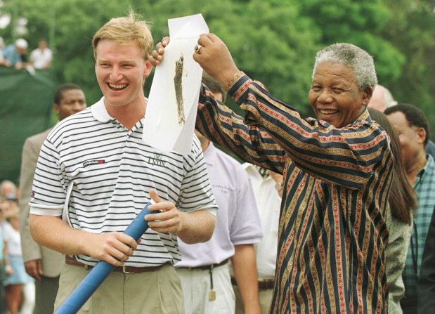 Els was the first South African golfer to win a major title after Mandela came to power in 1994. They are seen here before the final round of the 1996 South African PGA Championship.