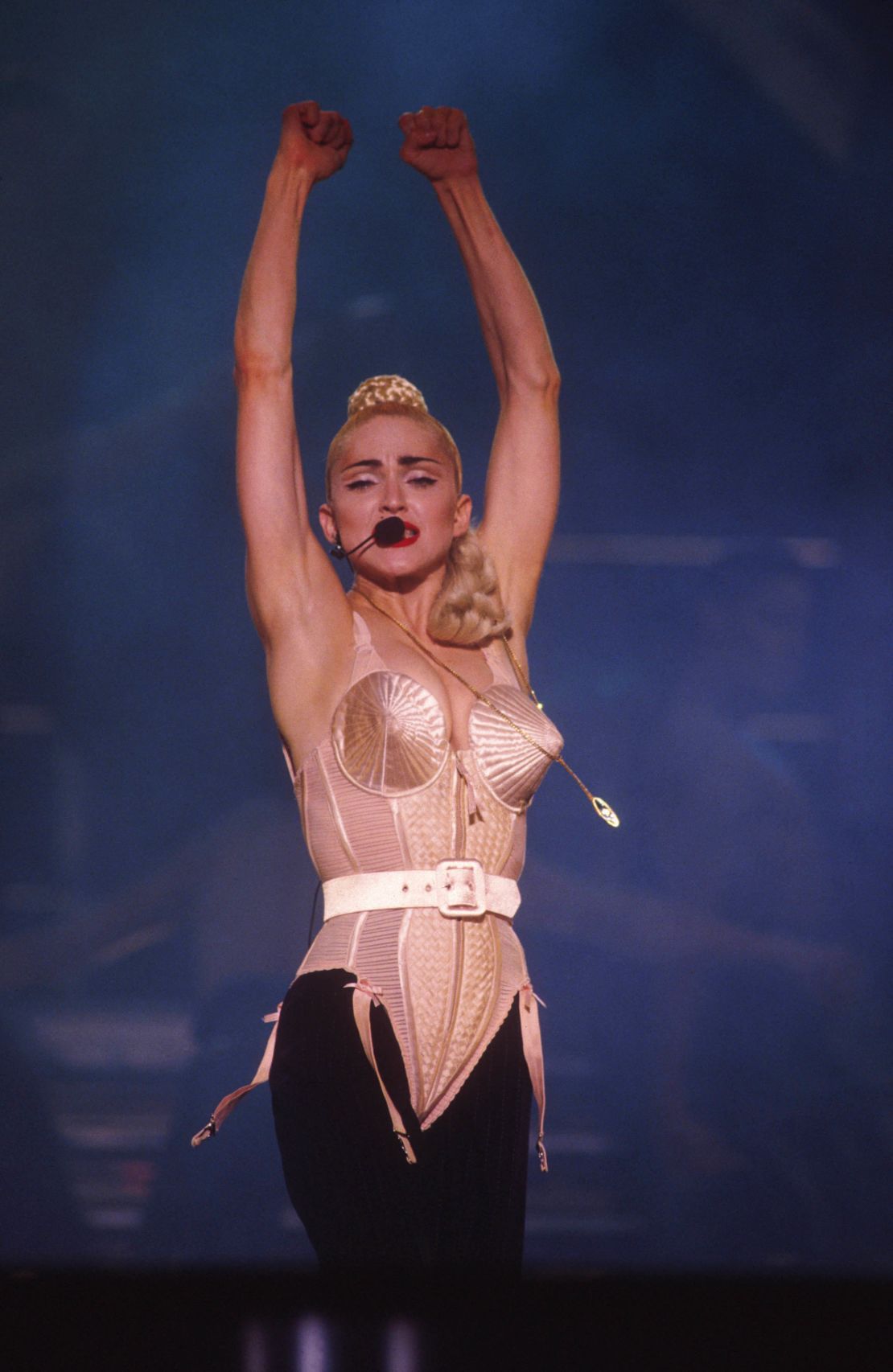 Madonna performing in her cone shaped bra from the Blond Ambition tour.