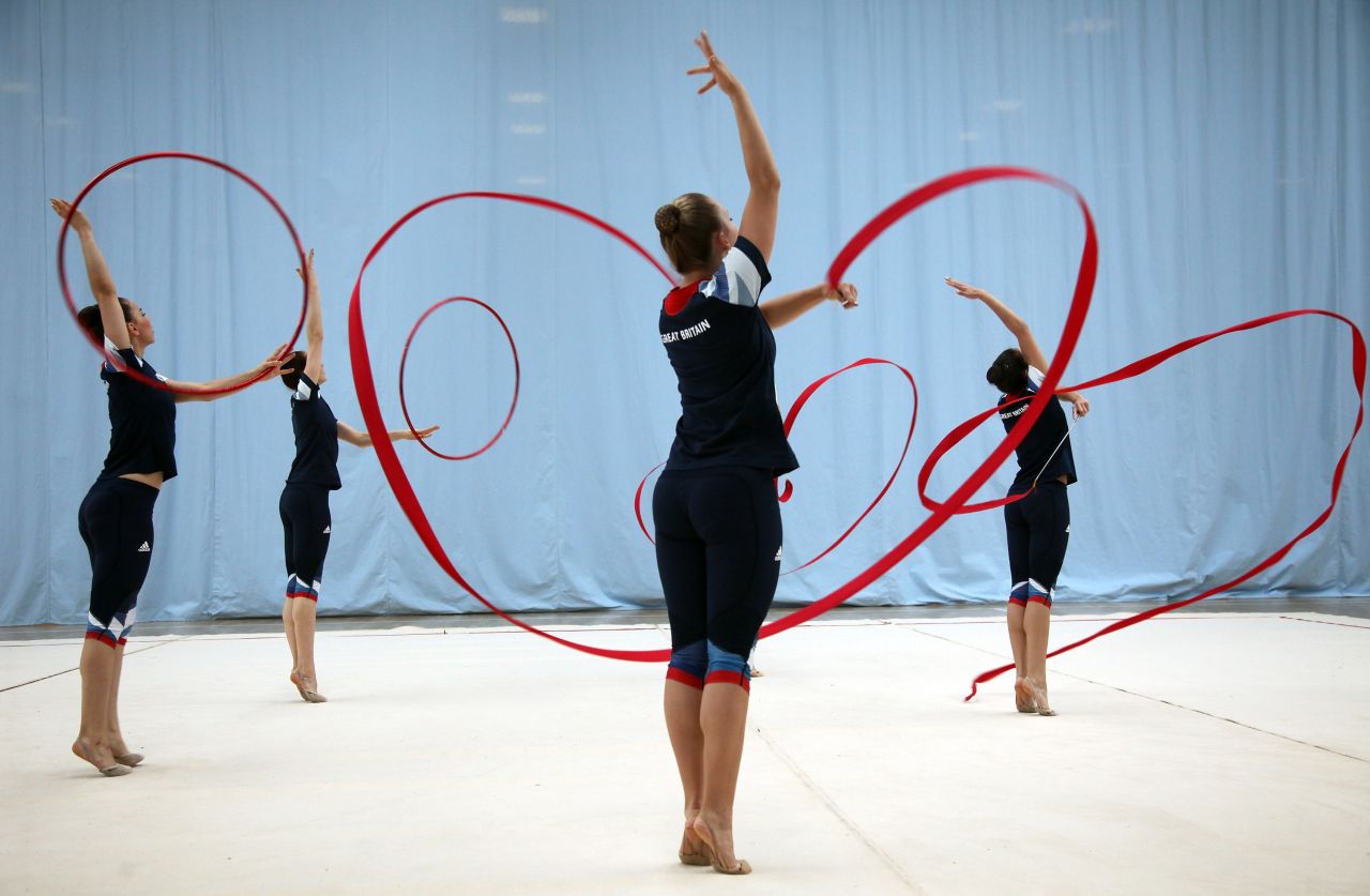 Club swinging first appeared at the 1904 St. Louis Olympics and involved athletes twirling clubs. Historians believe it was the precursor to rhythmic gymnastic events that use ribbons and hoops.