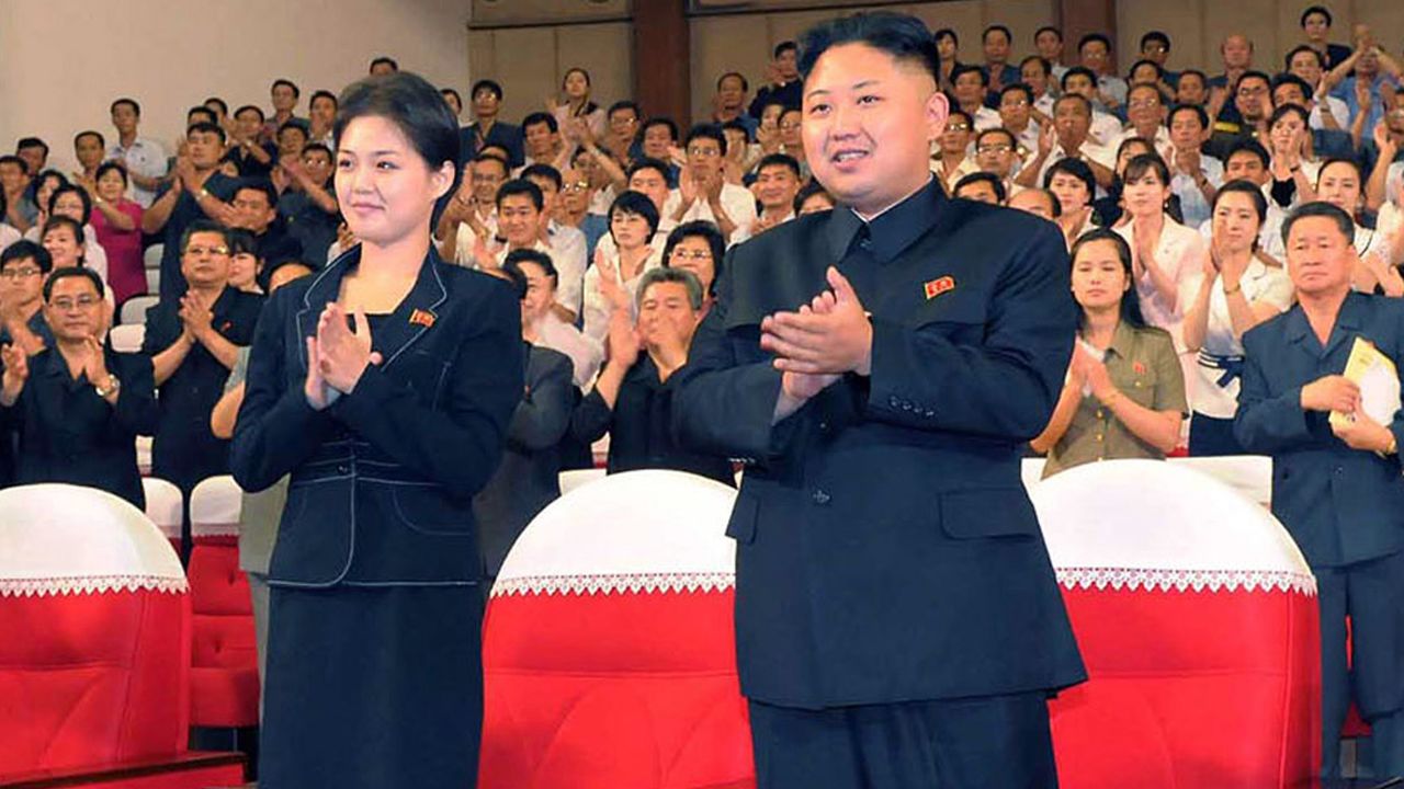 Kim Jong Un is shown with a young woman this month. It is not known if she is Ri Sol Ju.