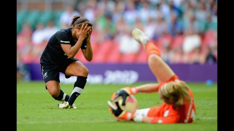 Sarah Gregorius of New Zealand reacts after Karen Bardsley of Great Britain saves the ball, barring her from scoring a goal.