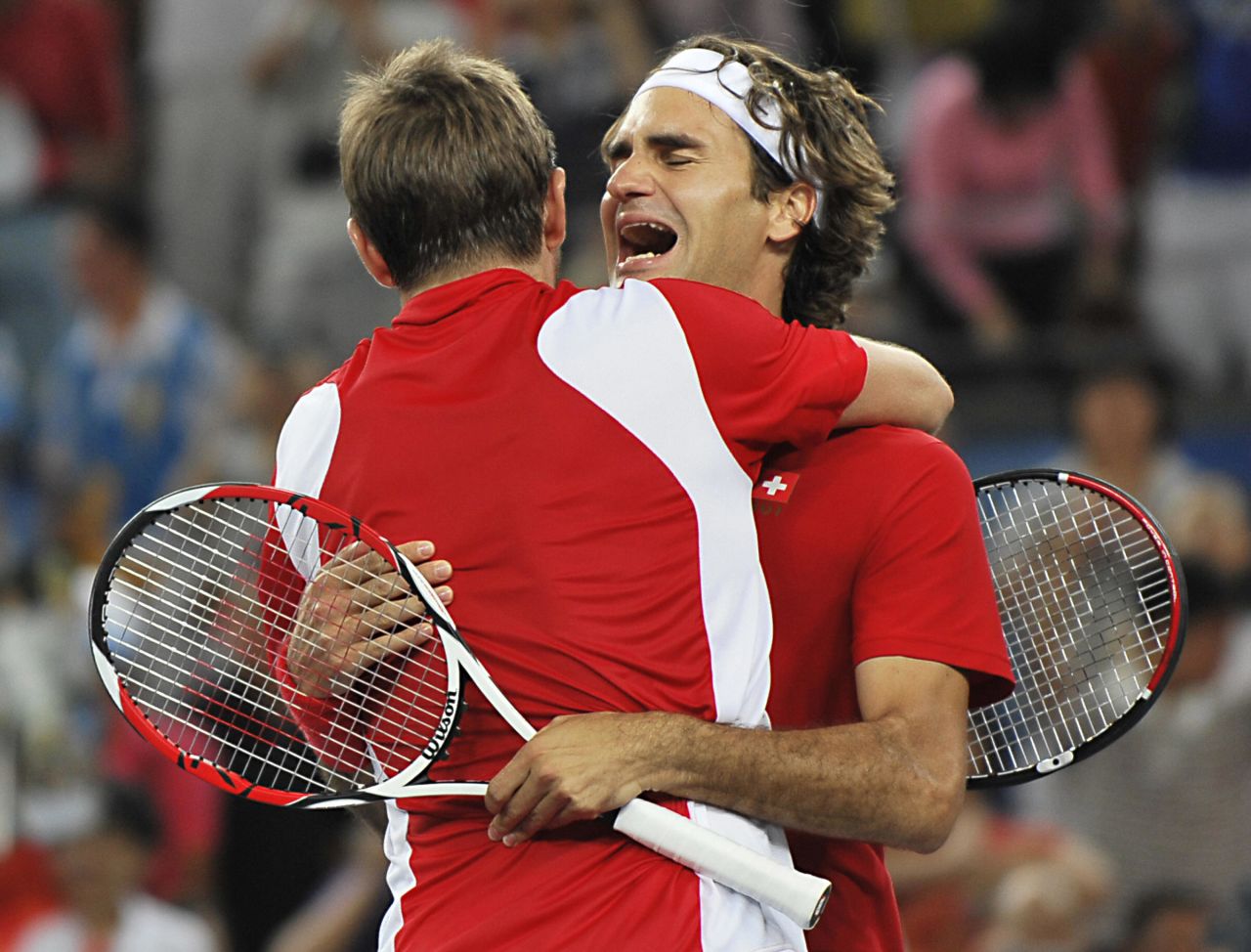 Federer breaks down as the significance of their achievement gets the better of him.