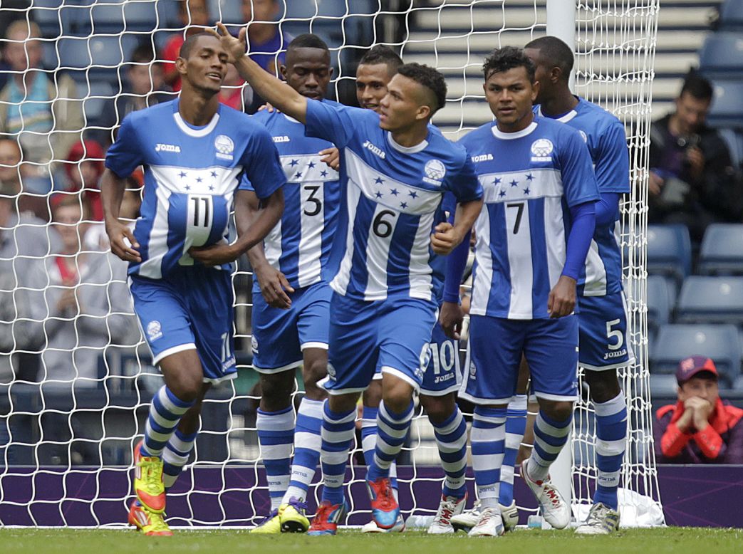 The Honduras men's soccer team celebrates after scoring a goal against Morocco during a first-round match Thursday.