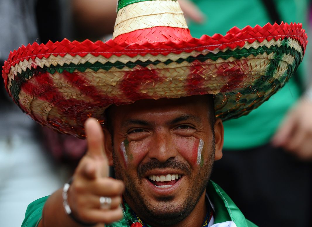 A Mexican fan watches the men's soccer match Thursday between Mexico and South Korea in Newcastle-upon-Tyne.