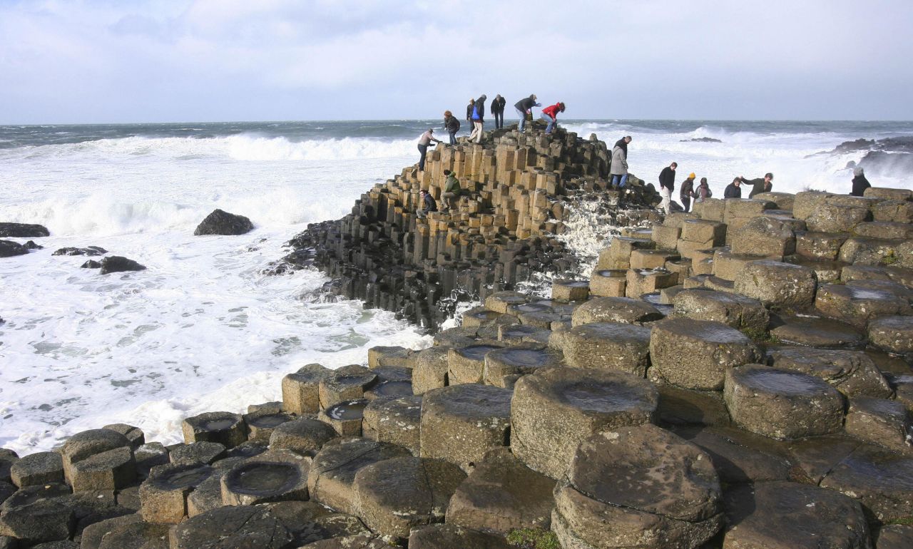 <strong>Giant's Causeway (Antrim): </strong>Legend has it that these interlocking basalt columns were formed when Irish giant Finn McCool built a bridge across the Irish Sea so he could go fight a Scottish giant with whom he had beef. The scientific explanation is almost as good, though. The 40,000 pillars are the result of a volcanic eruption some 50 to 60 million years ago.  