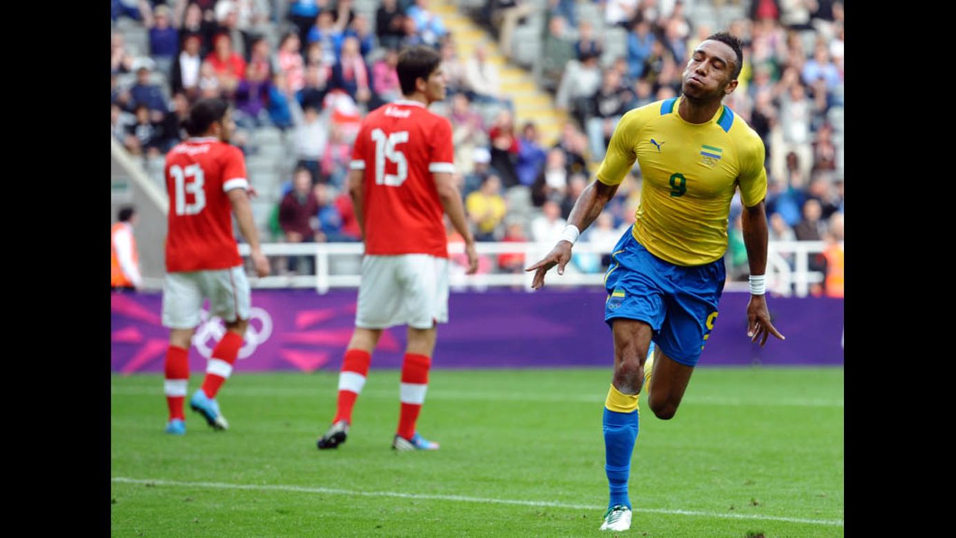 Gabon's Pierre-Emerick Aubameyang, right, celebrates after scoring a goal during the men's soccer match against Switzerland on Thursday in Newcastle-upon-Tyne, England.
