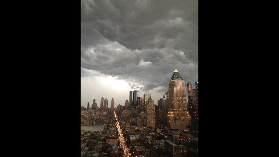 Dark clouds hang over Manhattan on Thursday, July 26, in this photo from iReporter Thomas Piercy.