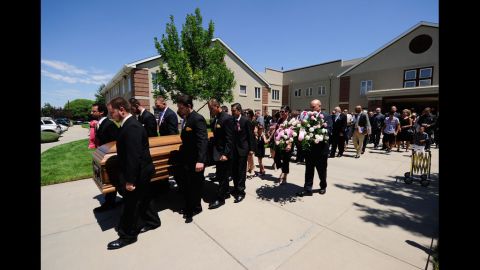 Pallbearers carry Micayla Medek's coffin during her funeral at the New Hope Baptist Church on Thursday.