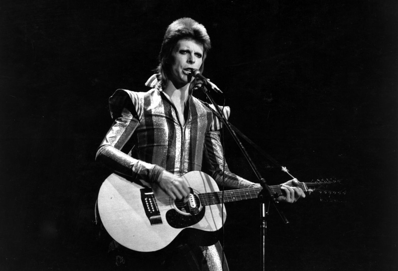 David Bowie performs his final concert as Ziggy Stardust in 1973 at the Hammersmith Odeon, London. His hit "Heroes" was used to introduce the home nation Team GB to the Olympic stadium.