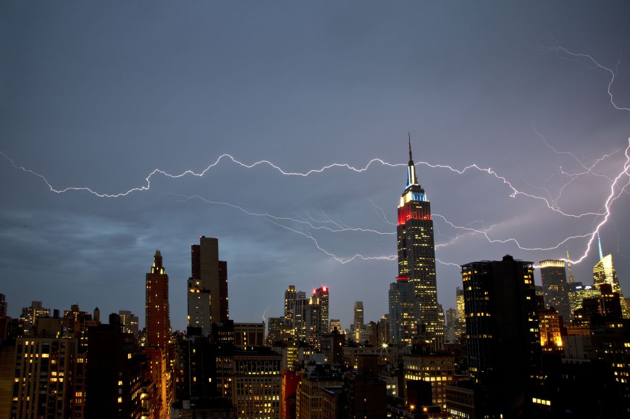 iReporter Matthew Burke reports the strong storms in New York on Thursday night produced quite a show. He said it looked like the lightning initially struck the Bank of America building and then snaked its way through the sky.
