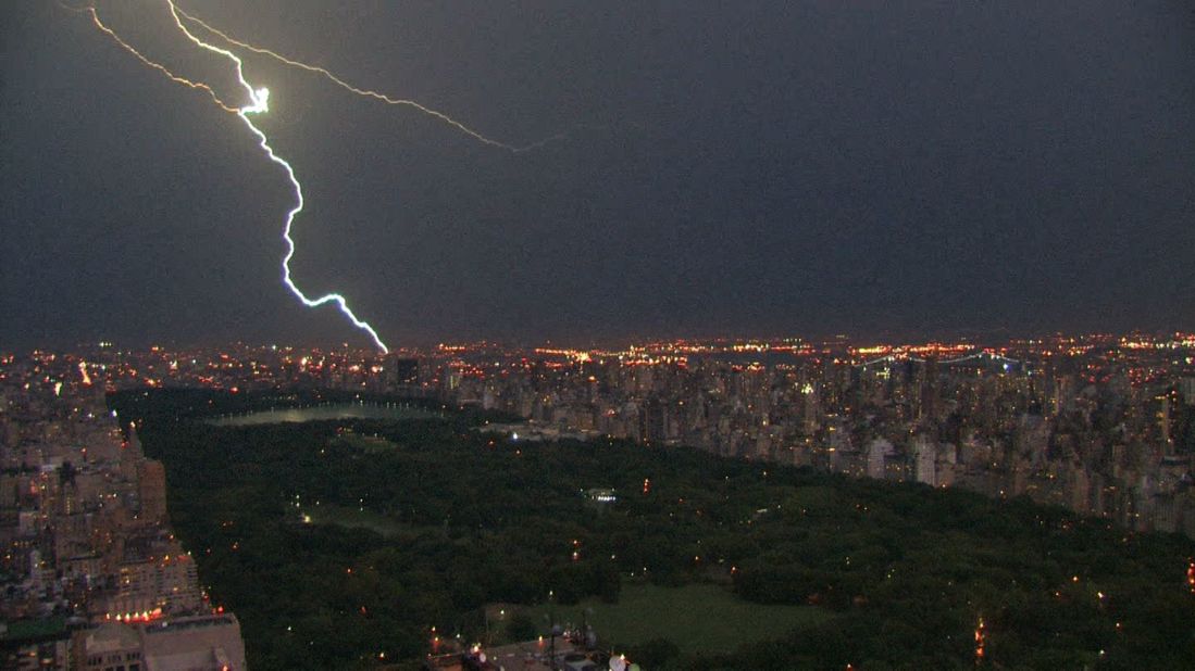 A lightning bolt strikes in New York, lighting up Central Park.