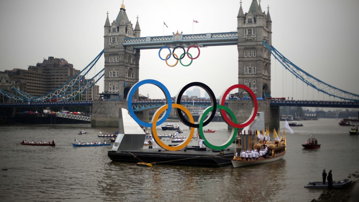 The giant Olympic rings are pictured next to Tower Bridge on the final day of the London 2012 Olympic Torch Relay on Friday.