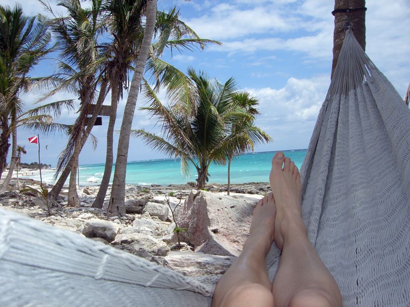 Warmenbol kicks her feet up in a hammock in Mexico.