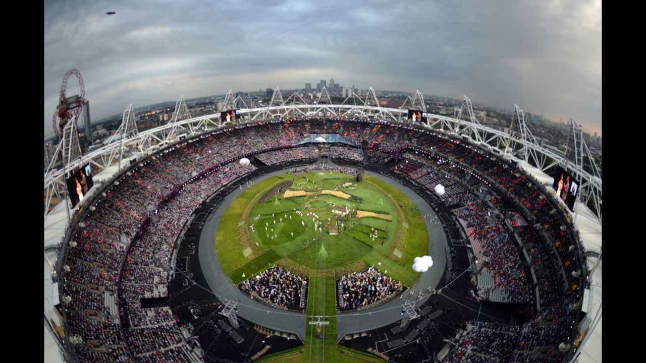 A robotic camera captures an overview of the Olympic Stadium at the start of the London 2012 Opening Ceremony.