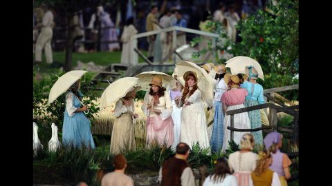 Performers depict a view of the English countryside.
