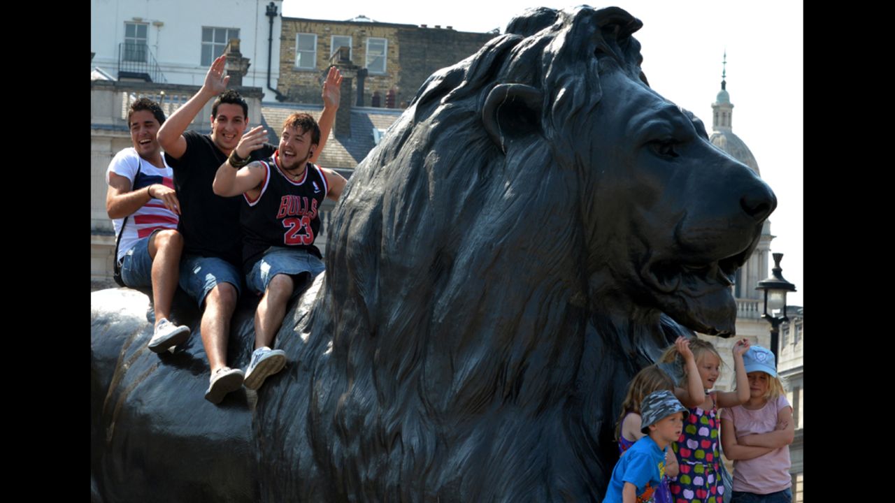 London's oldest amusement park ride, the Iron Lion, makes its way through the city at an average speed of 2 mph.