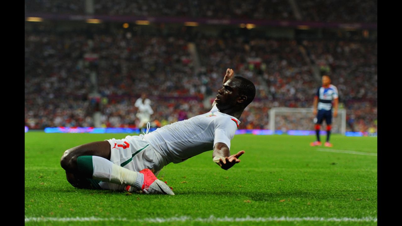 Moussa Konate of Senegal practices for the Olympic limbo competition.