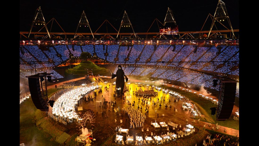 General view taken as actors perform during the opening ceremony.