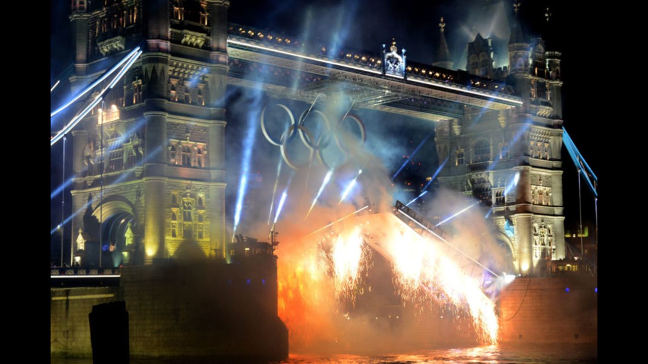 Fireworks go off from Tower Bridge.