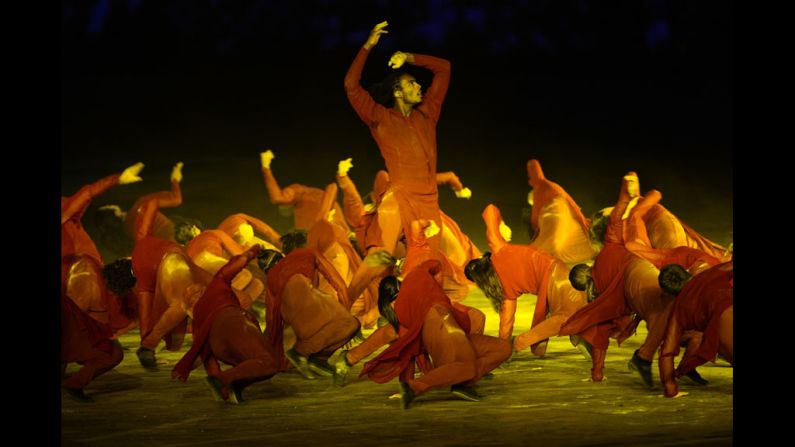 Dancers perform in a scene dramatizing the struggle between life and death.