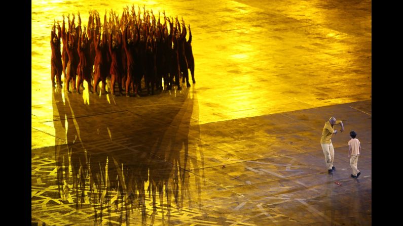 Performers dance during the opening ceremony.