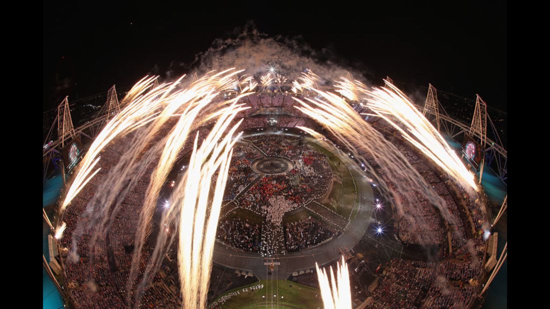 Fireworks go off over the Olympic Stadium at the official opening of the 2012 Games.