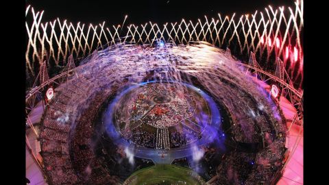 Fireworks light up the Olympic Stadium and the night sky.