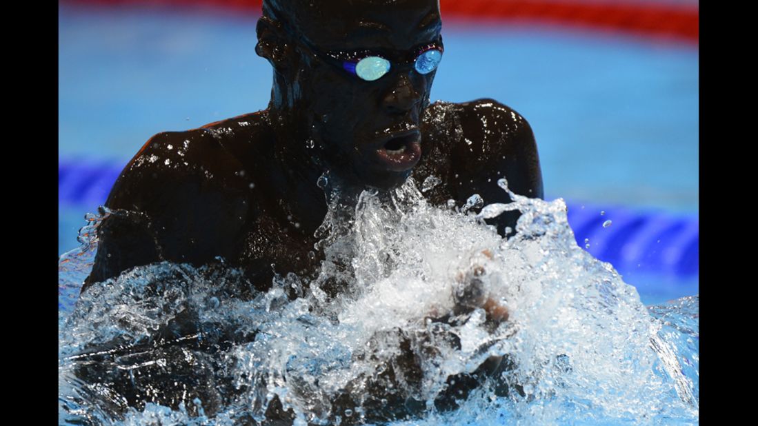 Senegal's Malick Fall competes in the men's 100-meter breaststroke heats.