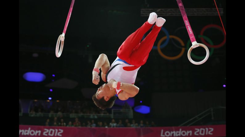 South Korea's gymnast Kim Hee Hoon competes on the rings during the men's qualification of the artistic gymnastics event.