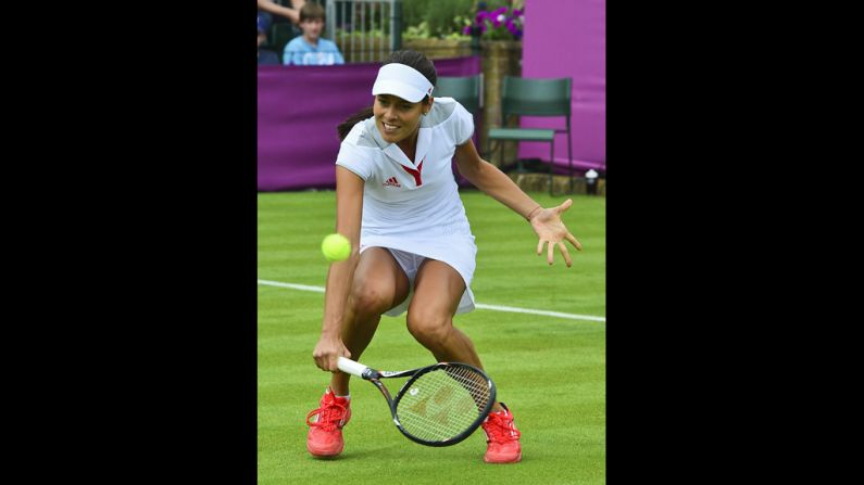 Serbia's Ana Ivanovic returns the ball to American Christina McHale during their women's singles tennis match.