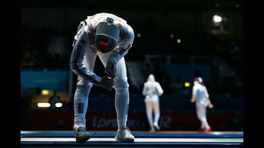 Great Britain's Anna Bentley celebrates winning her women's foil match against Monica Peterson of Canada.