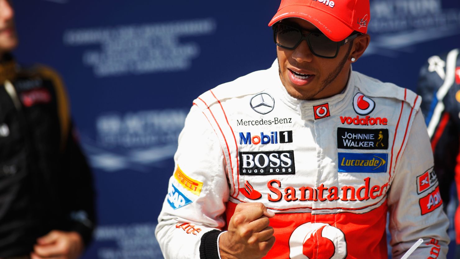 McLaren driver Lewis Hamilton celebrates his pole position for tomorrow's Hungarian grand prix