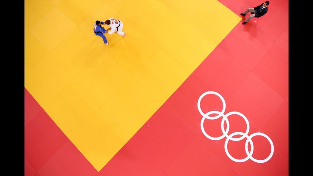 Two athletes compete in the men's judo event.