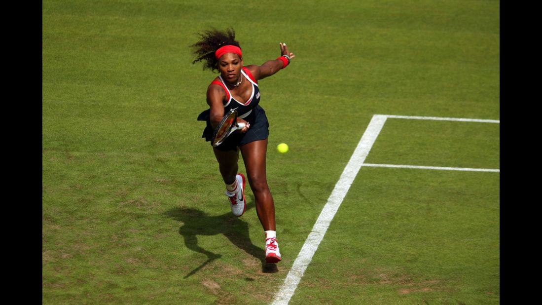 U.S. tennis player Serena Williams returns a shot against Jelena Jankovic of Serbia during their women's singles tennis match.