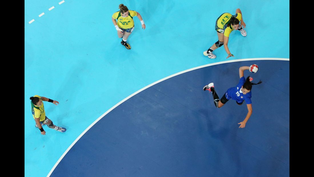 Maja Zebic of Croatia attacks the goal in women's handball preliminaries between Croatia and Brazil.