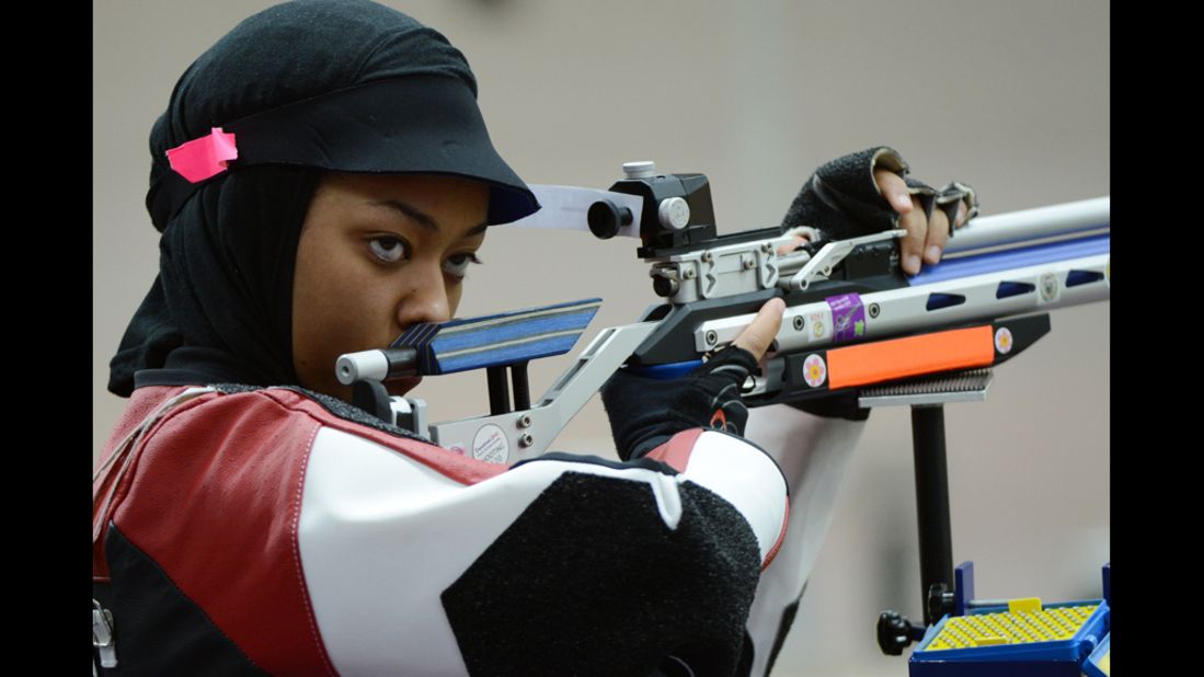 Qatari shooter Bahya Mansour al-Hamad competes during the 10 meter air rifle women's qualification.