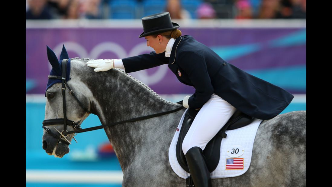 Tiana Coudray of the United States riding Ringwood Magister competes in the dressage equestrian event.