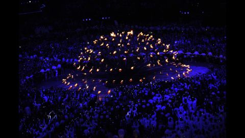 A wide view of the cauldron lighting inside the Olympic Stadium.