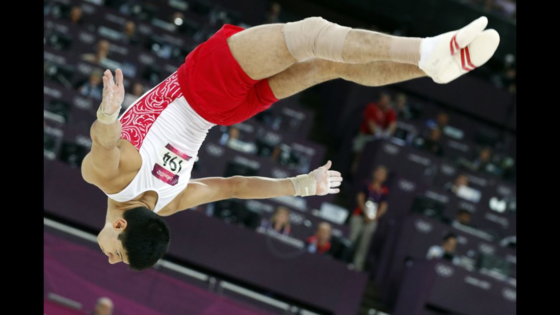 Russian gymnast Emin Garibov in the air during the men's artistic gymnastics qualification.