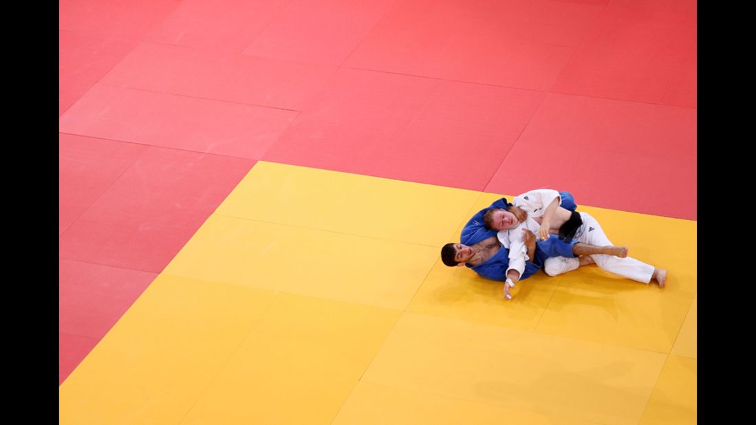 Tobias Englmaier of Germany, in white, and Hovhannes Davtyan of Armenia compete in the men's judo competition. See photos from <a href="http://www.cnn.com/2012/07/29/worldsport/gallery/olympics-day-two/index.html" target="_blank">Day 2 of the competition.</a>
