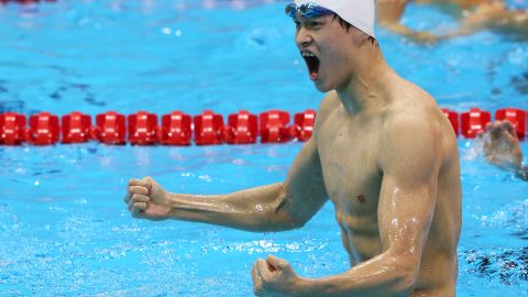 Sun Yang celebrates his gold medal in the 400m freestyle.