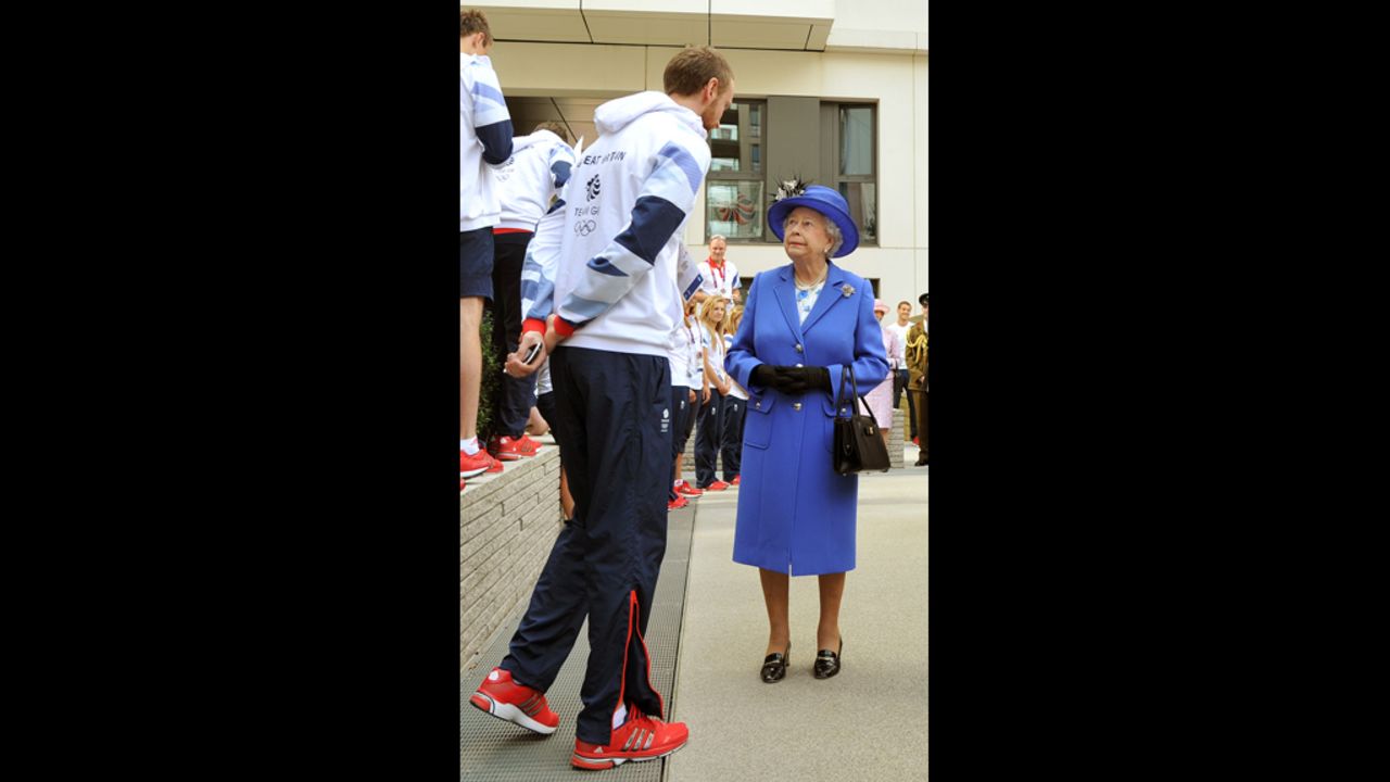 Queen Elizabeth sizes up a rival before her daily one-on-one basketball game.