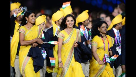 Members of India's delegation parade in the opening ceremony.