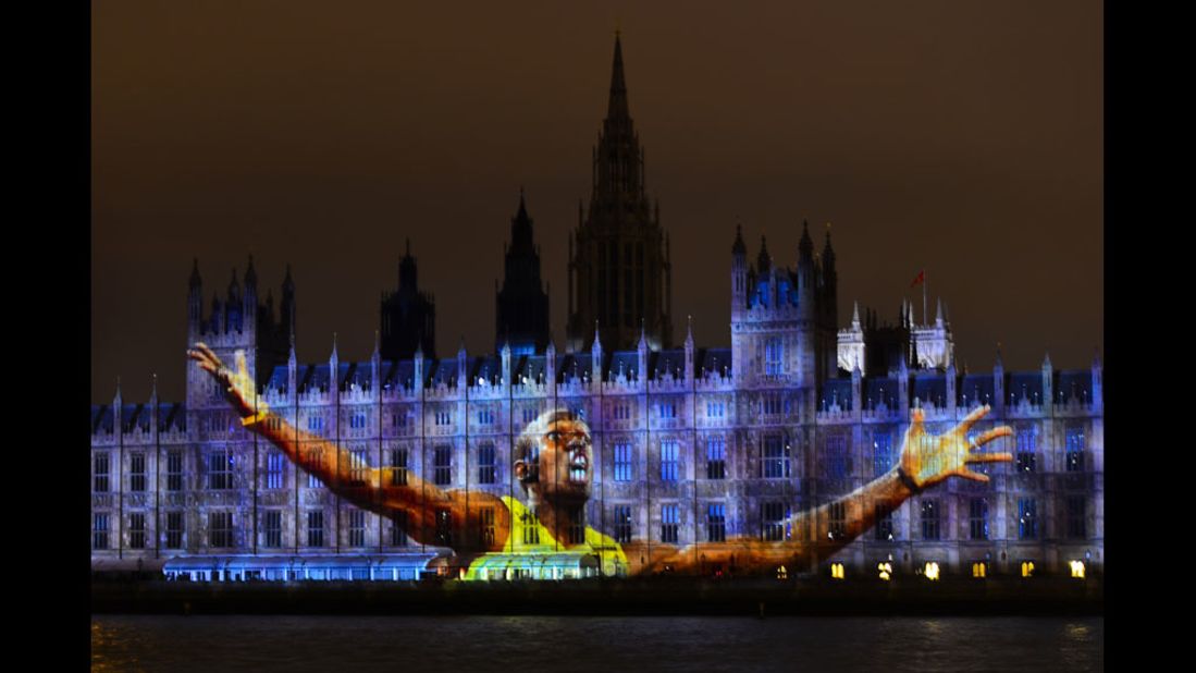 An image of Jamaica's track star Usain Bolt, currently the world's fastest man, is projected on The Houses of Parliament in London.