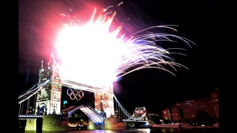 Fireworks explode from the top of Tower Bridge.